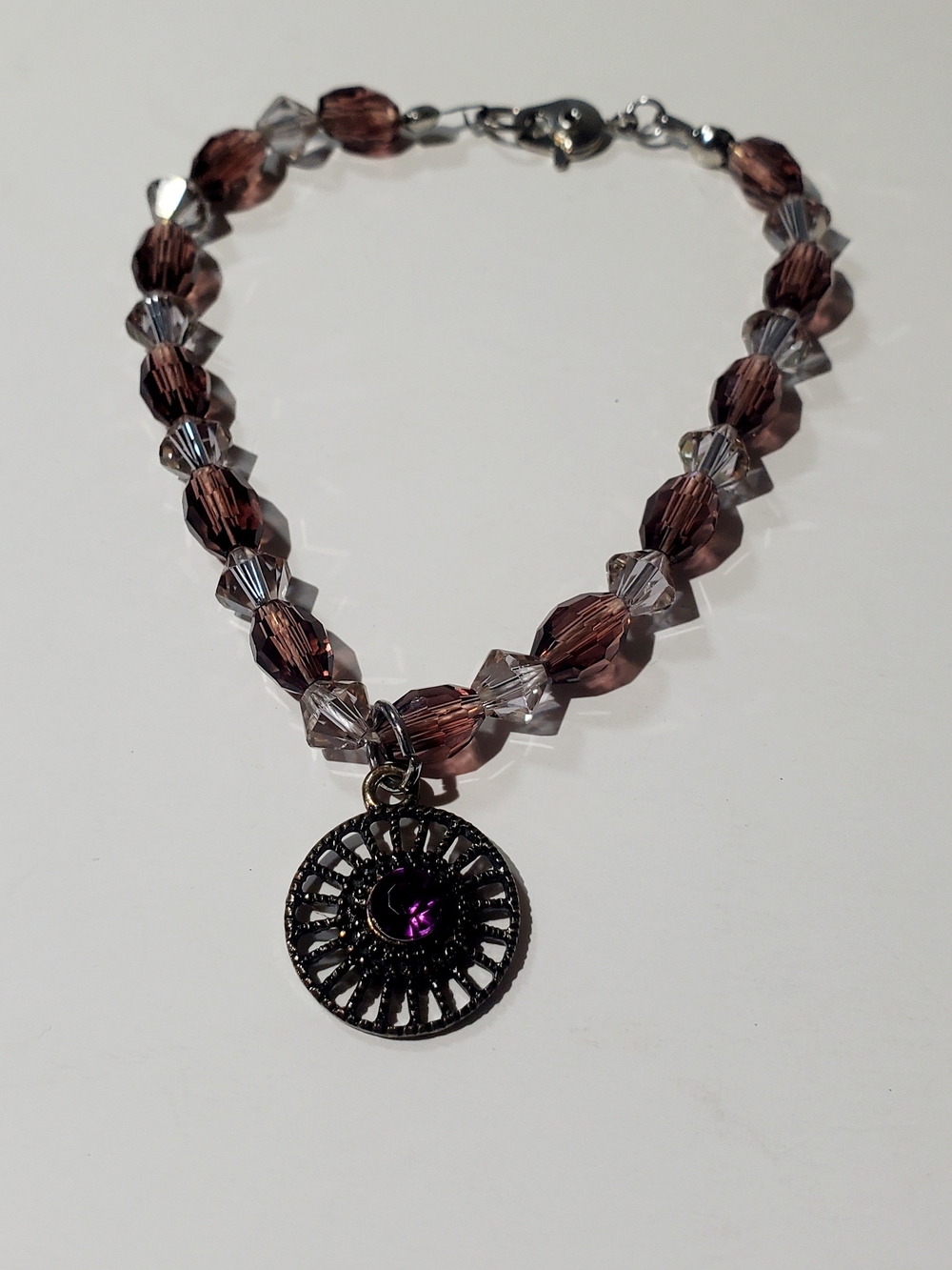 Purple Crystal Bead Bracelet with Medallion Pendant